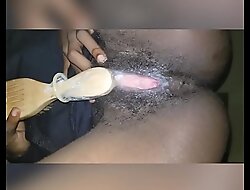 Fucking my hairy black pussy with hair brush